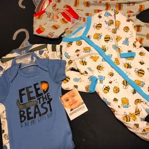 3 piece 3-6 months onesies set, two 1 piece 0-3 months sleep n play suits.